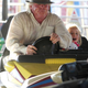 Illustration for article titled Its Friday, so here are photos of Gary Busey on a roller coaster and Nick Nolte riding a bumper car
